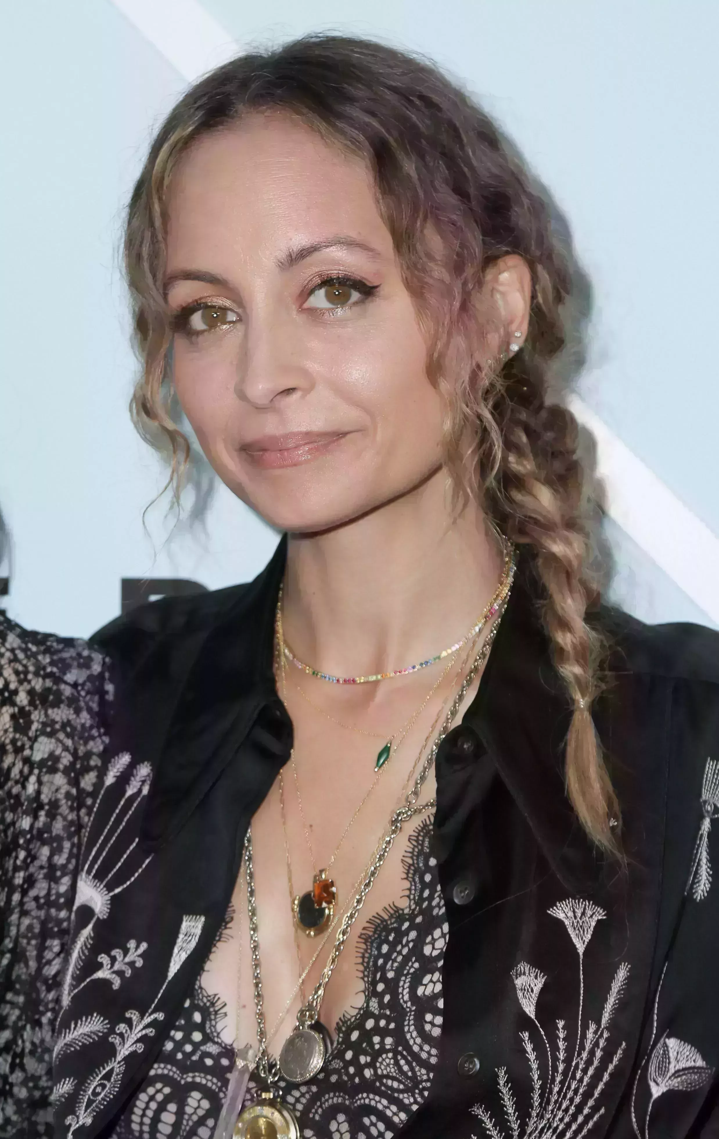 Nicole Richie’s Short Braid with Frizzy Waves