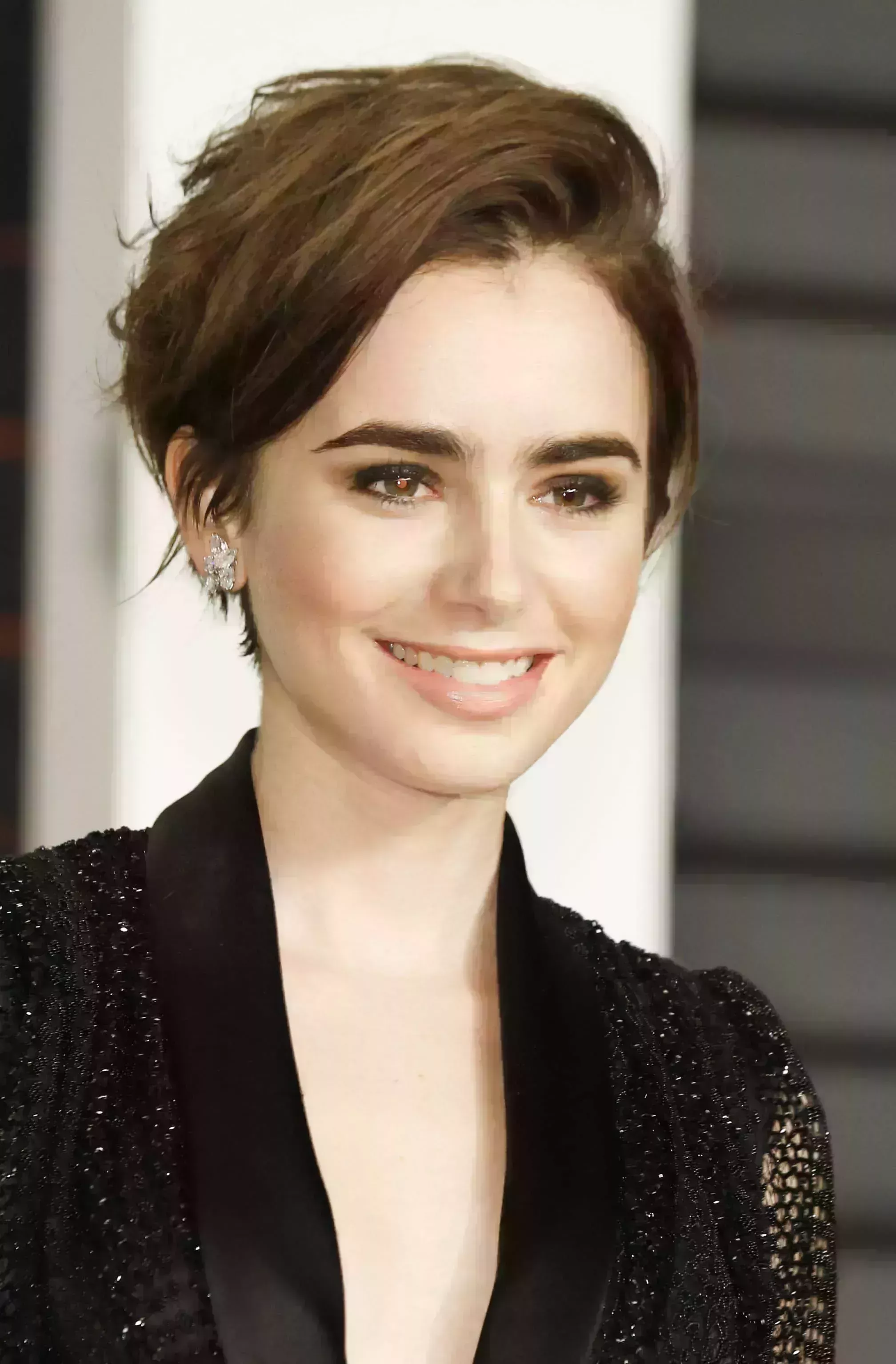 Lily Collins’ Side Swept Pixie