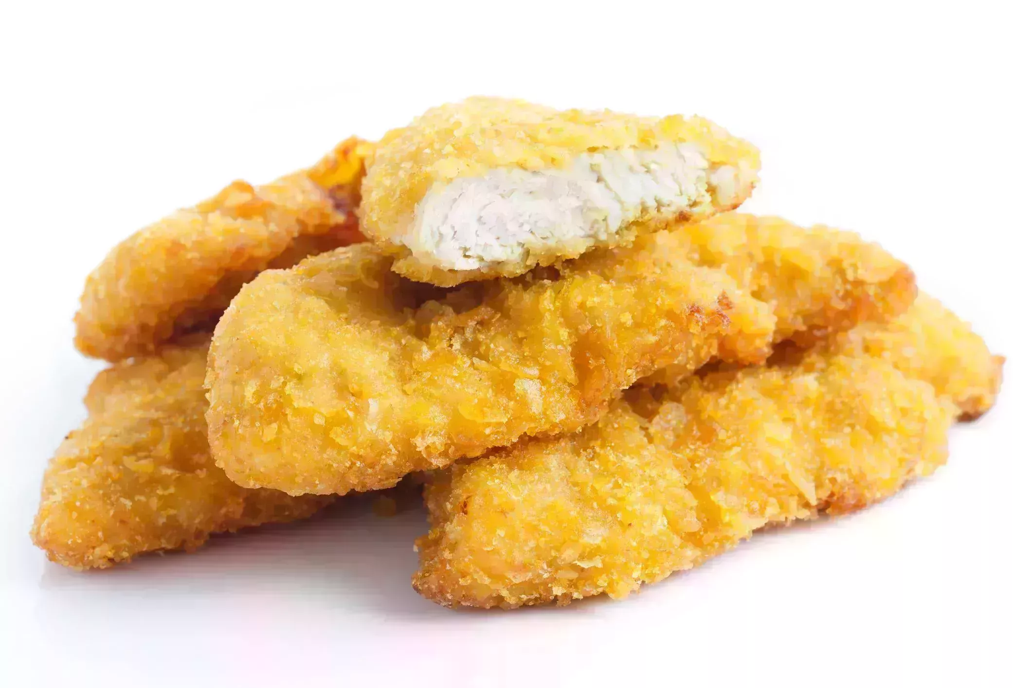 golden fried chicken strips on white