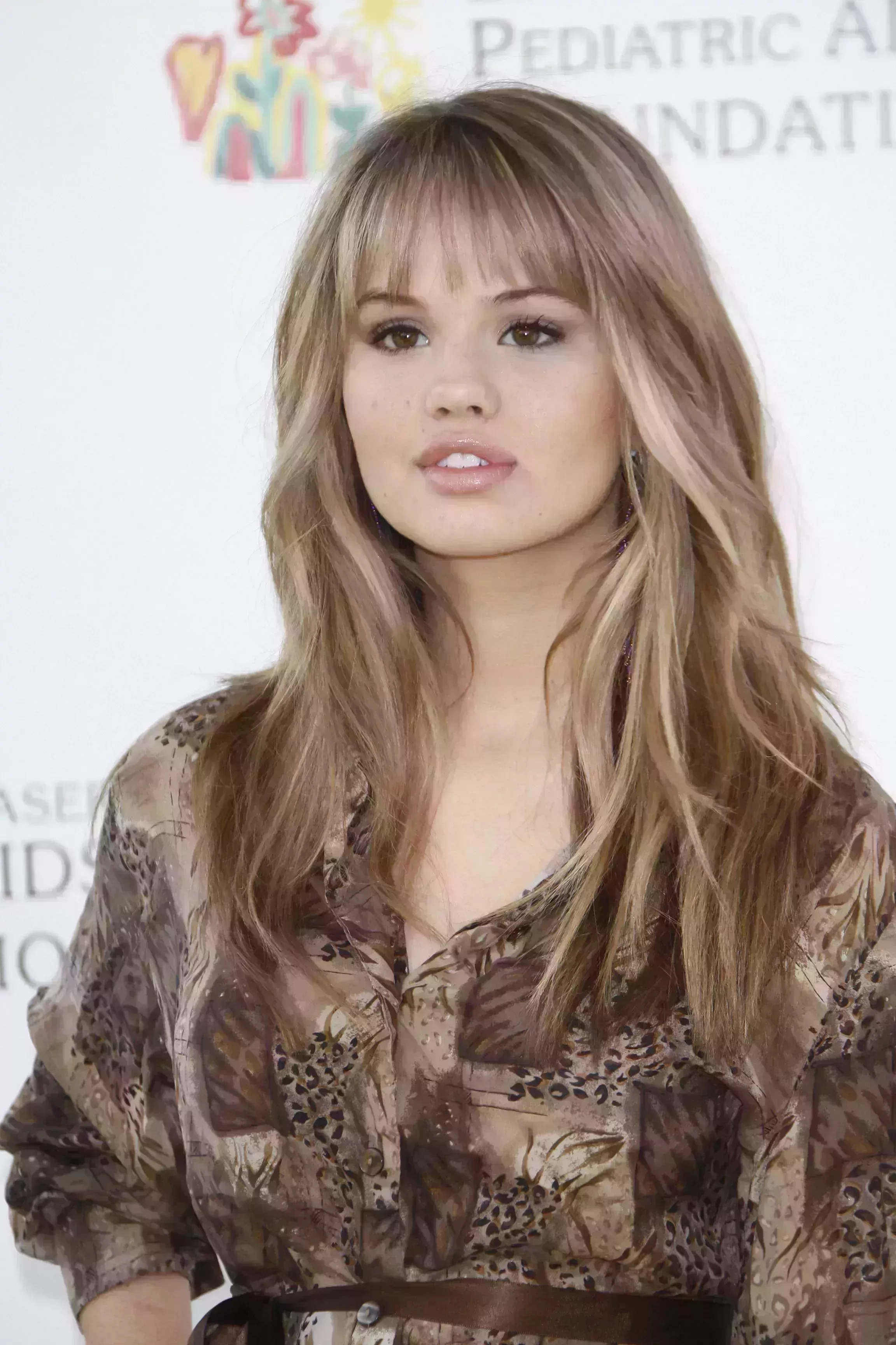 Debby Ryan’s Brown Hair with Silver Highlights