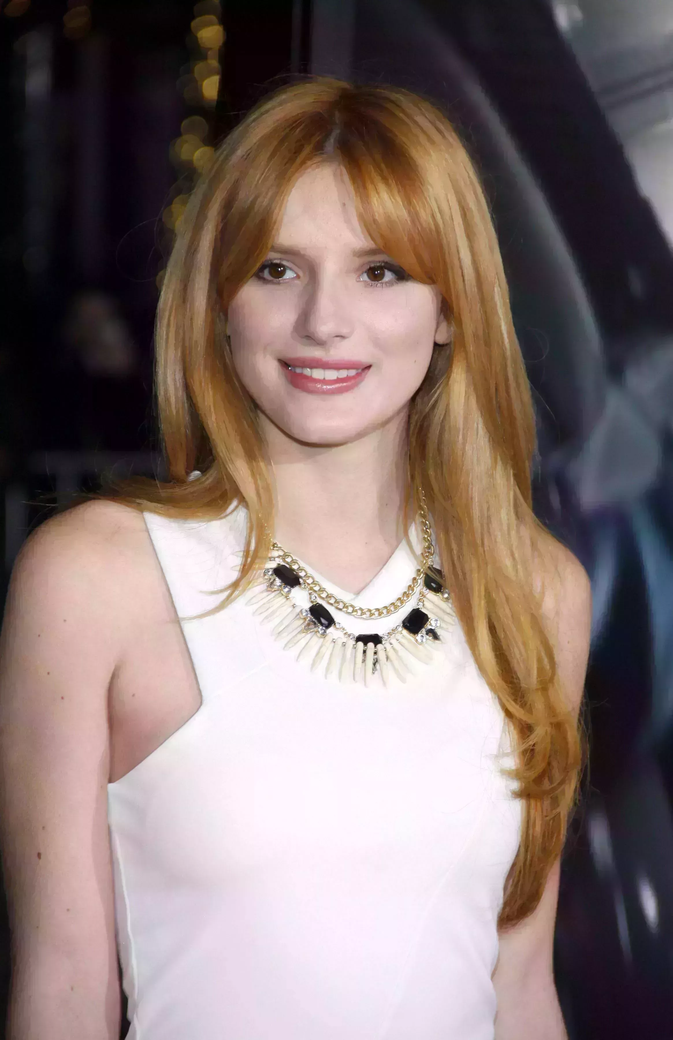 Bella Thorne’s Red Hair with Silver Highlights