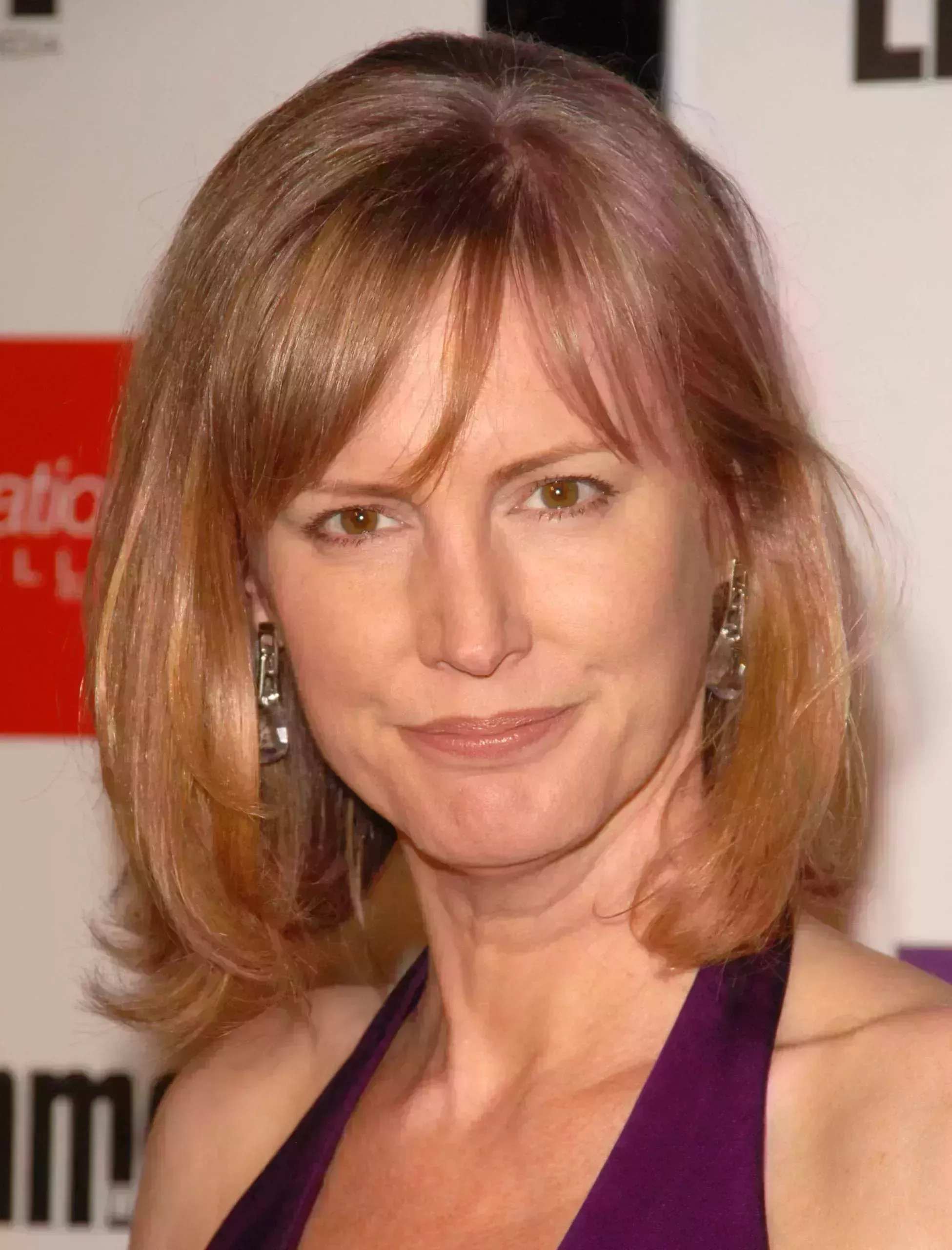 Melissa Rosenberg’s Curtain Bangs and Long Bob