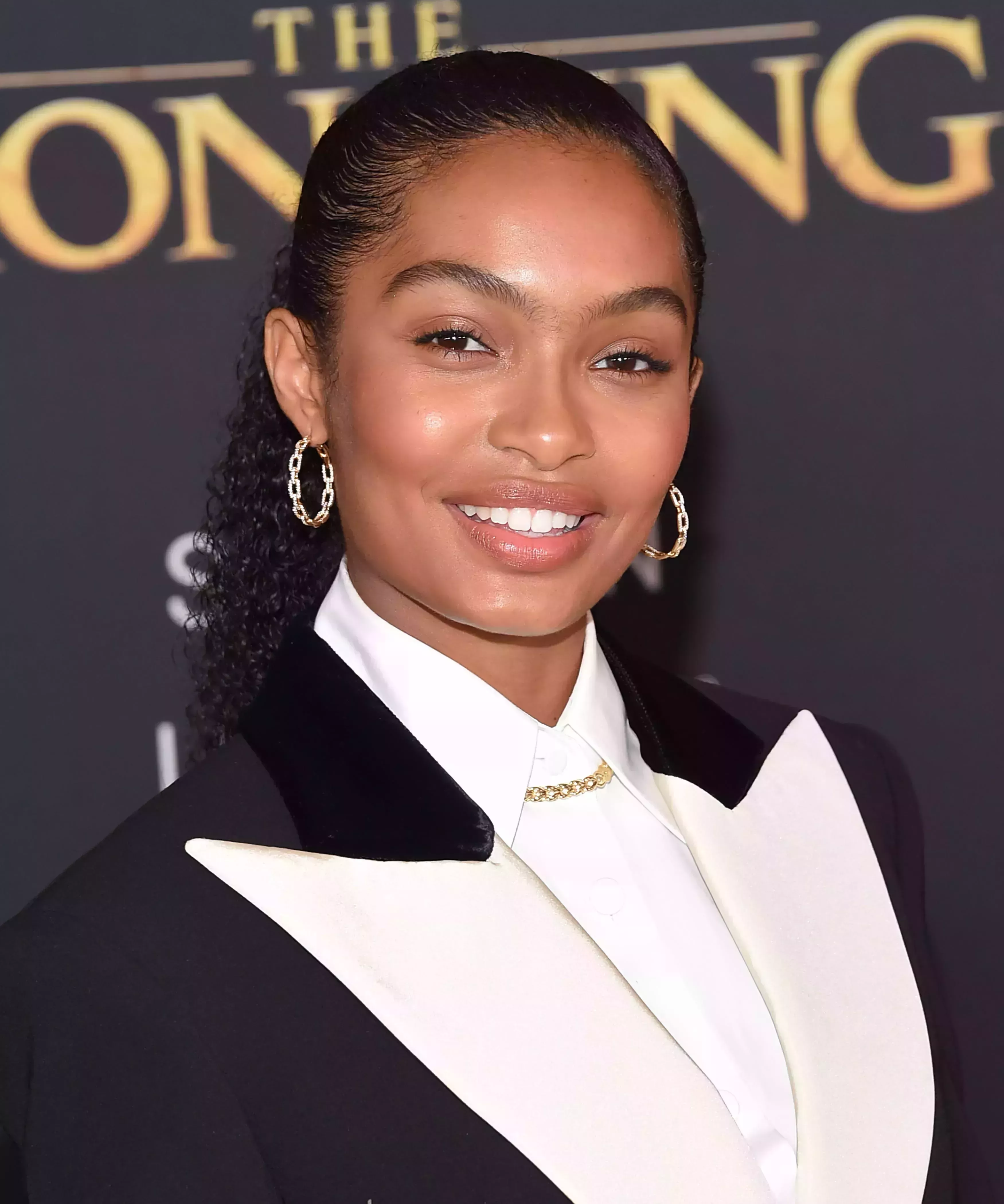 Yara Shahidi’s Slicked-Back Curly Ponytail