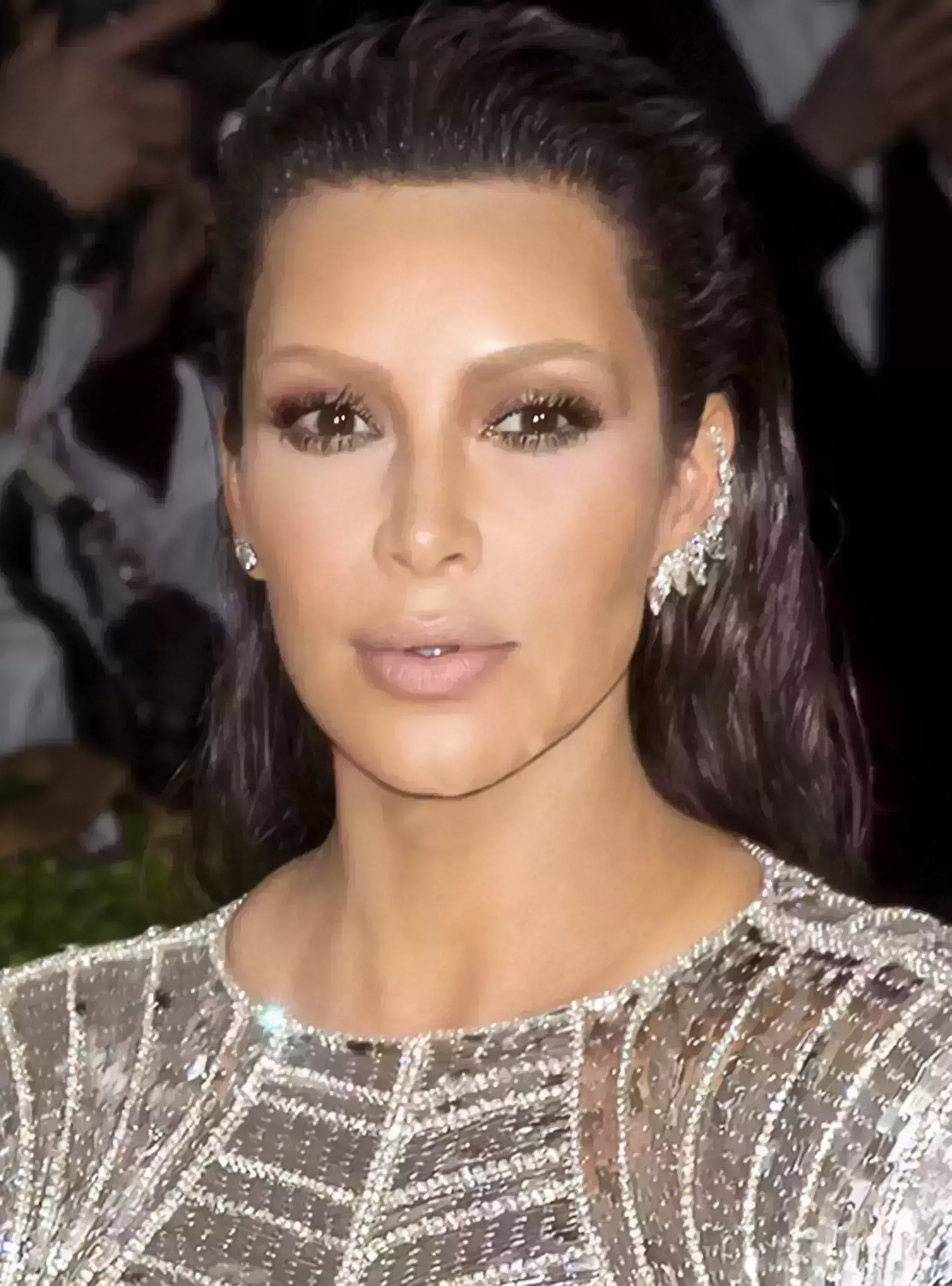 Kim K’s Wet-Look, Slicked-Back Hairstyle