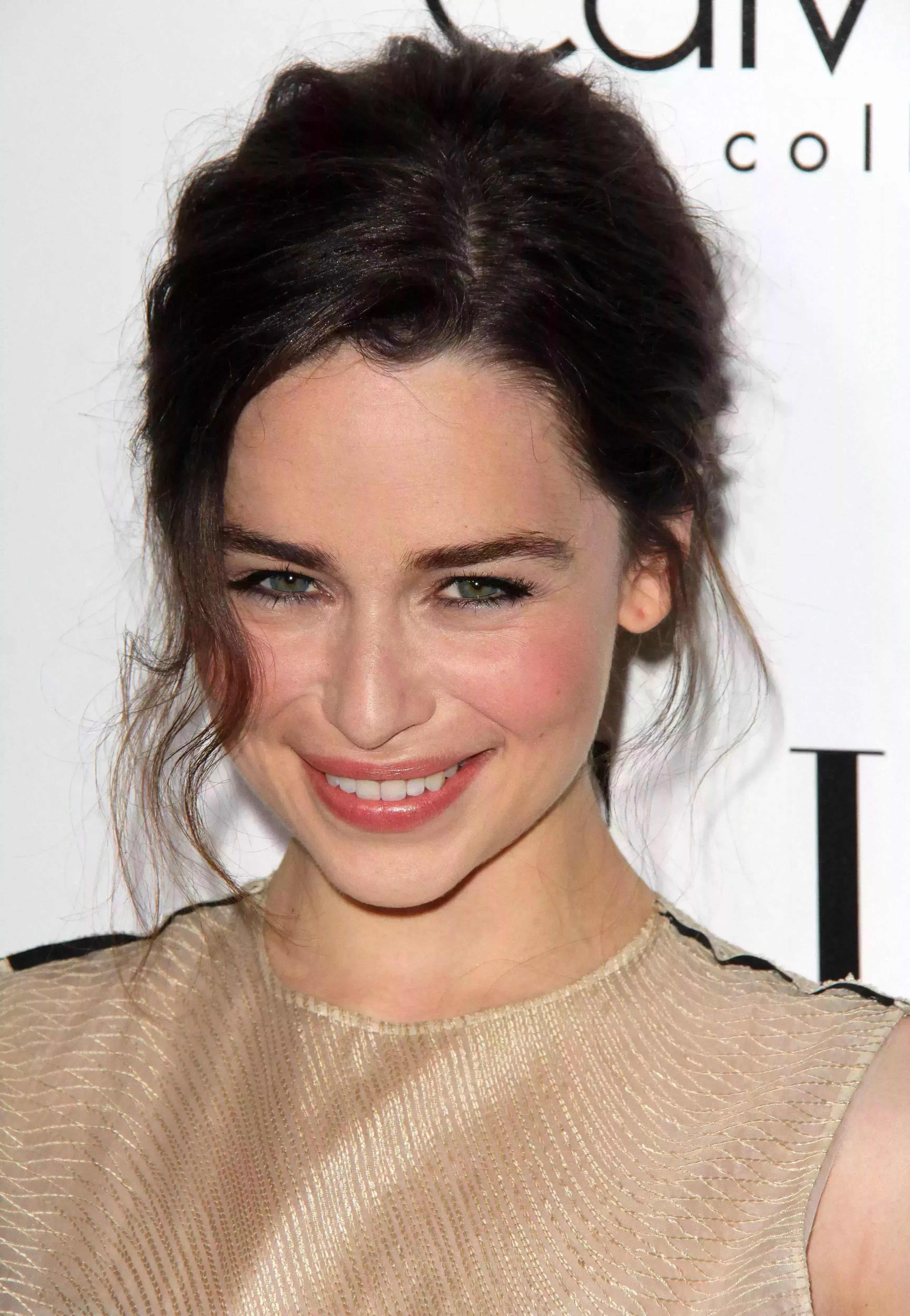 Emilia Clarke’s Fringed Thin Updo