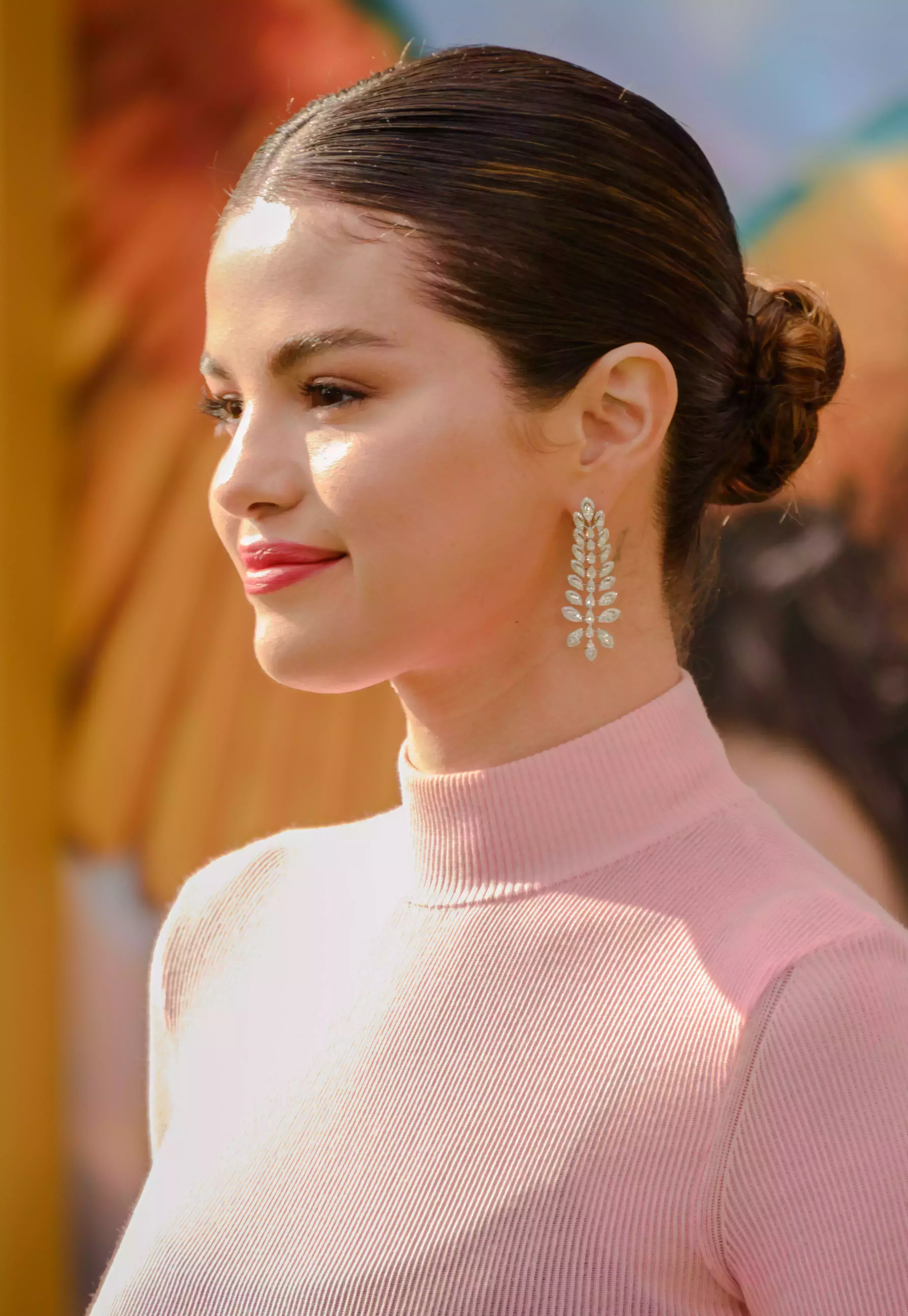 Selena Gomez Parting it in the Middle for the Bun