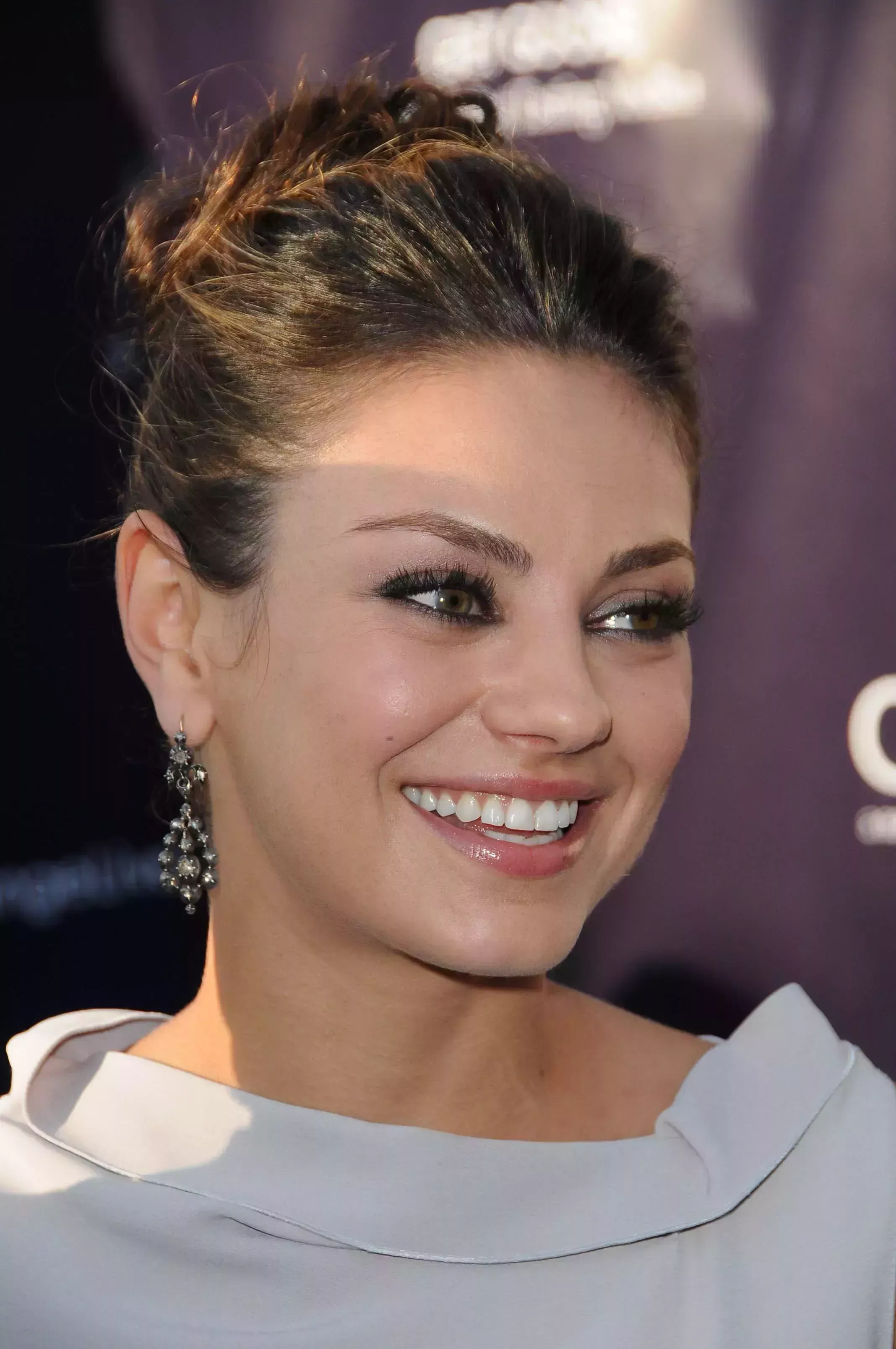 Mila Kunis with Casual Flat Top Updo