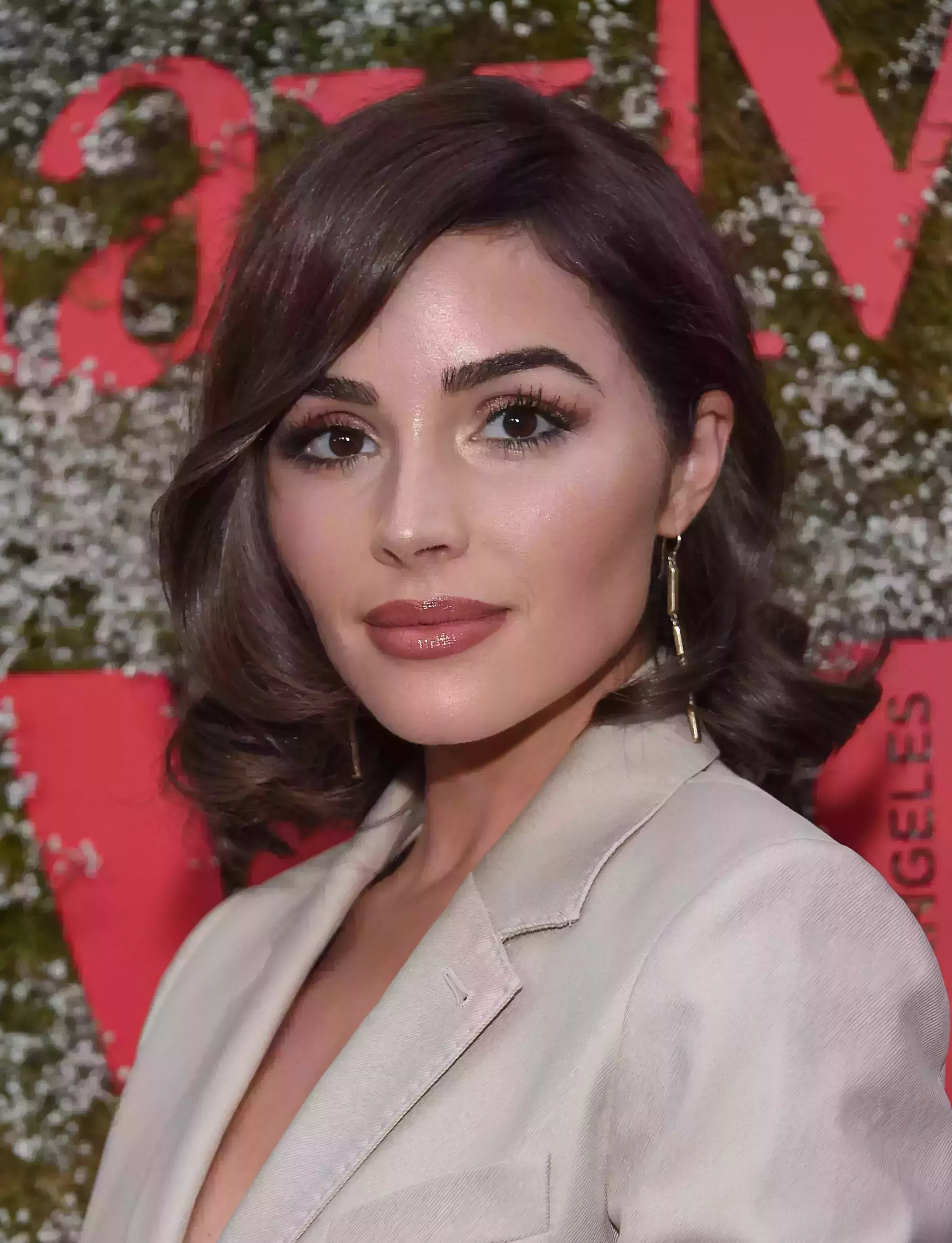 Olivia Culpo’s Side-Parted Curls