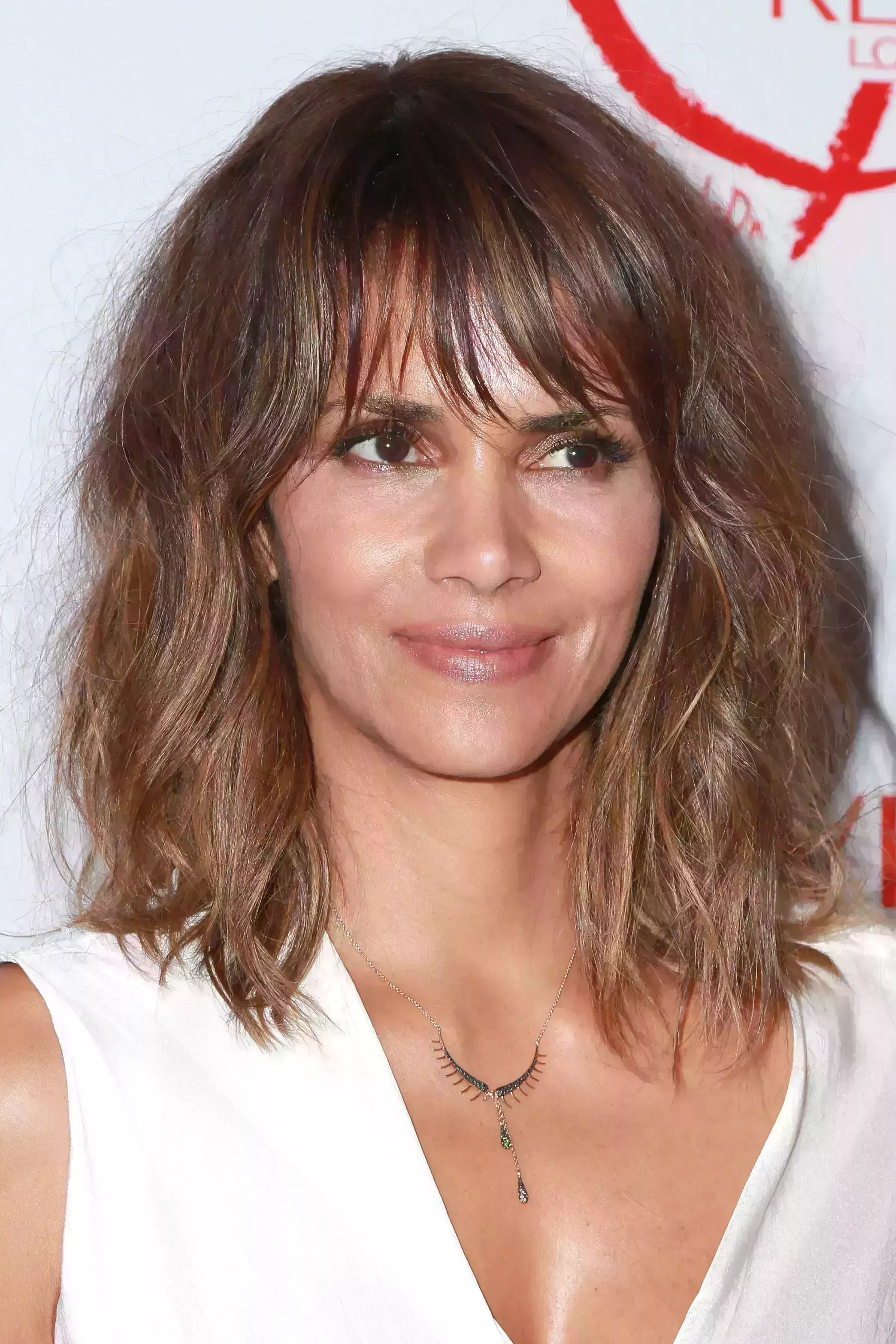 Halle Berry Keeps that Bang Frizzy