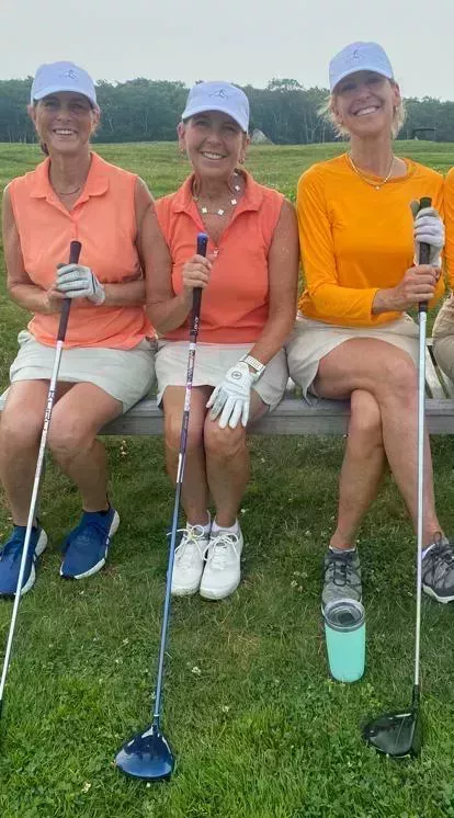 Friends golfing