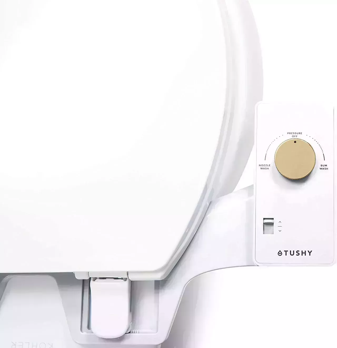 A white Tushy Classic 3.0 Bidet Attachment with a bamboo knob attached to a white toilet on white background