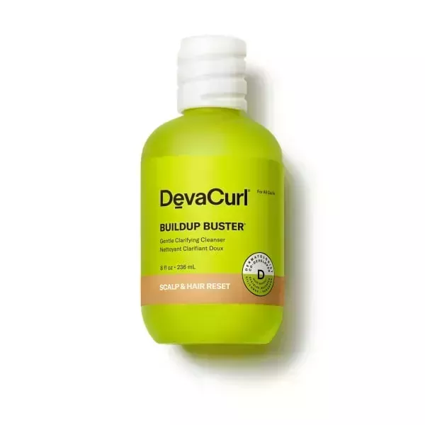 bottle of DevaCurl Buildup Buster Gentle Clarifying Cleanser on a white background