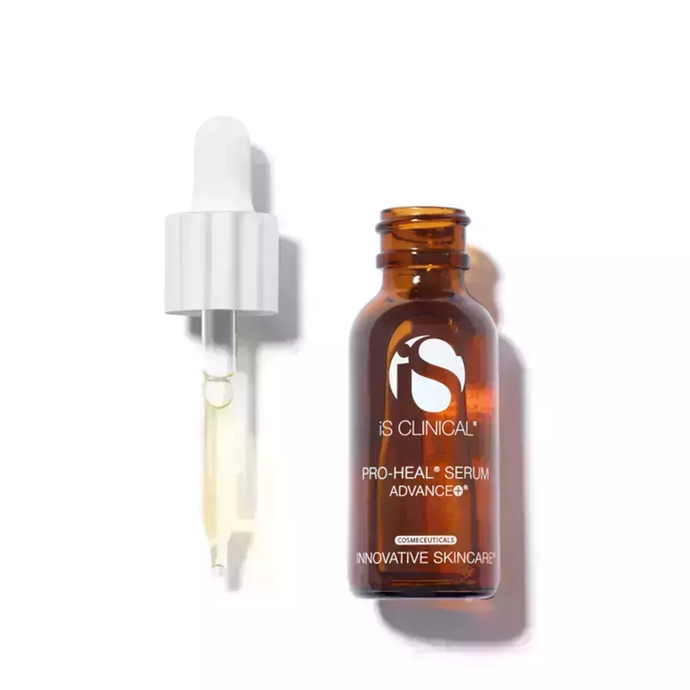 iS Clinical Pro-Heal Serum Advance+ and dropper on white background