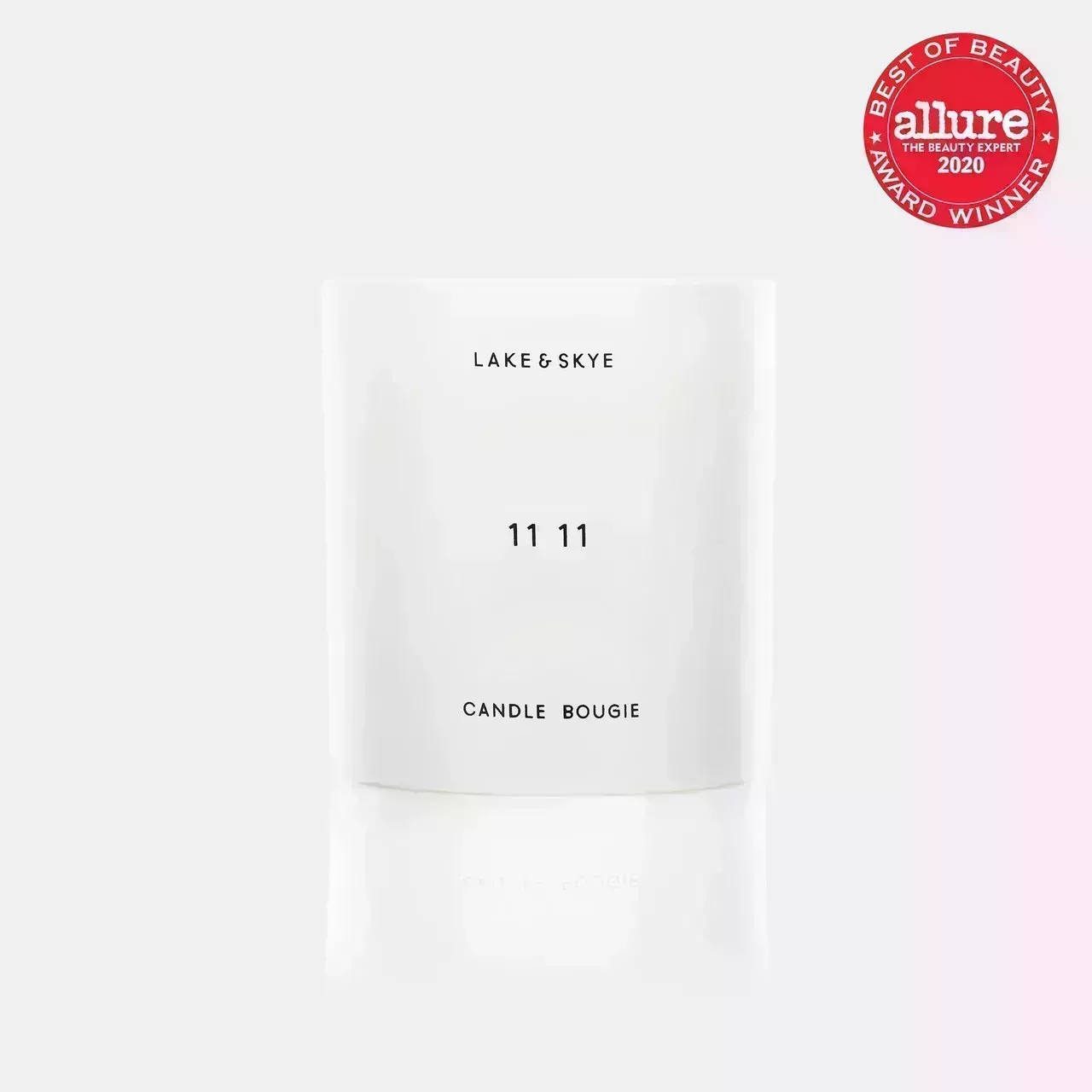 Lake & Skye 11:11 Candle on light gray background with red 2021 Allure Best of Beauty Award seal