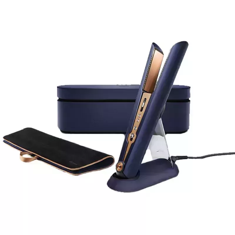 A photo of the Dyson Corrale Special Edition Gift Set containing a flat iron, storage case, and travel bag on a white background