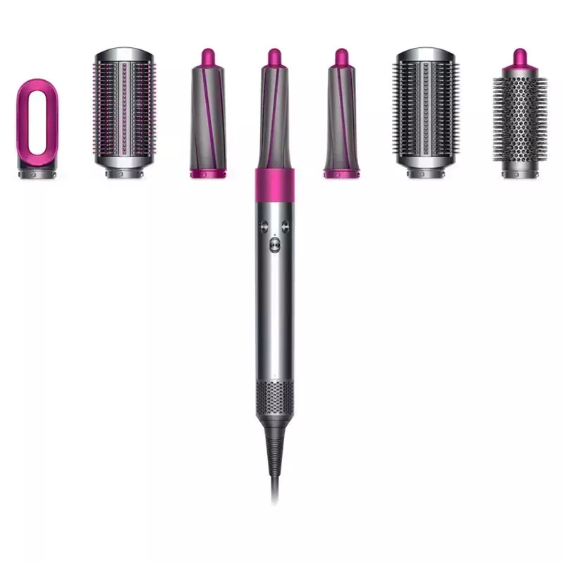 A photo of the Dyson Airwrap with all seven attachments on a white background
