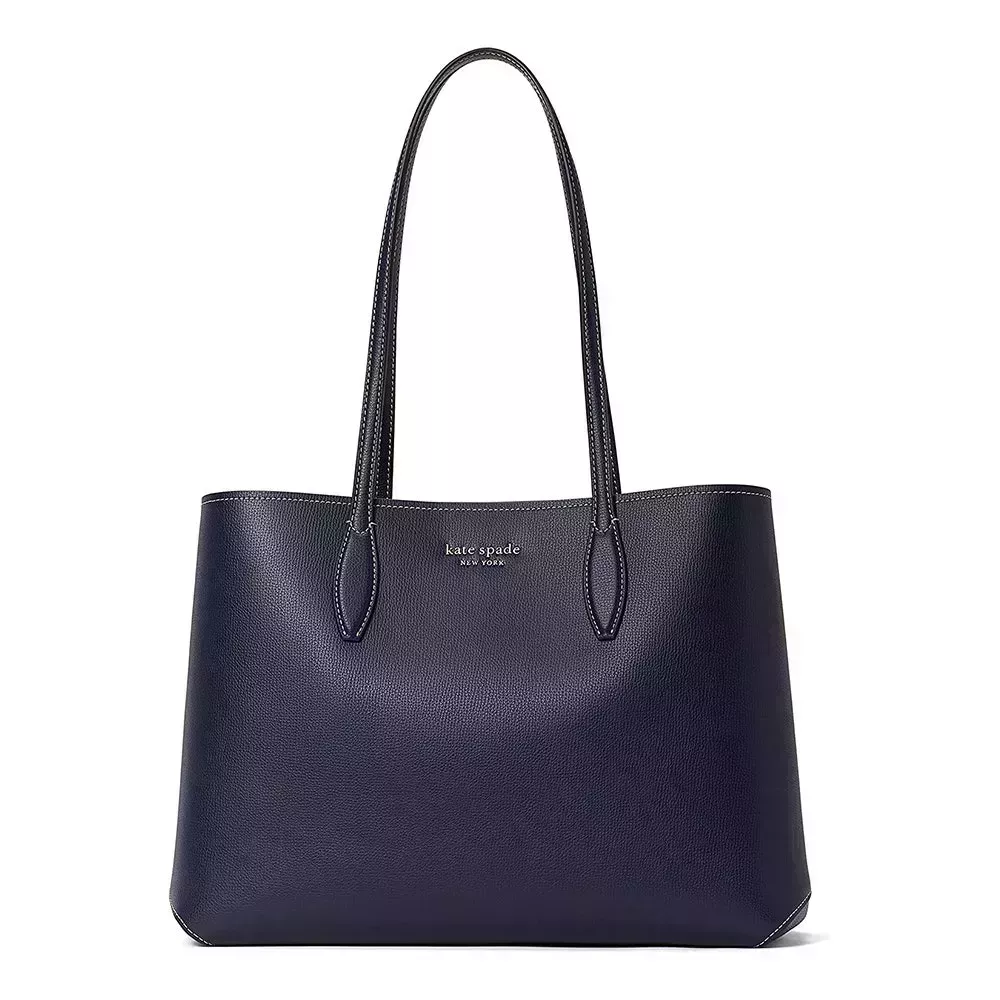 A navy Kate Spade All Day Large Tote on white background