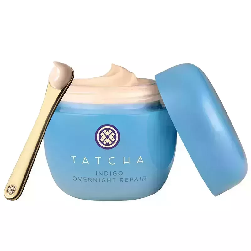 A jar of the Tatcha Indigo Overnight Repair Serum in Cream Treatment on a white background