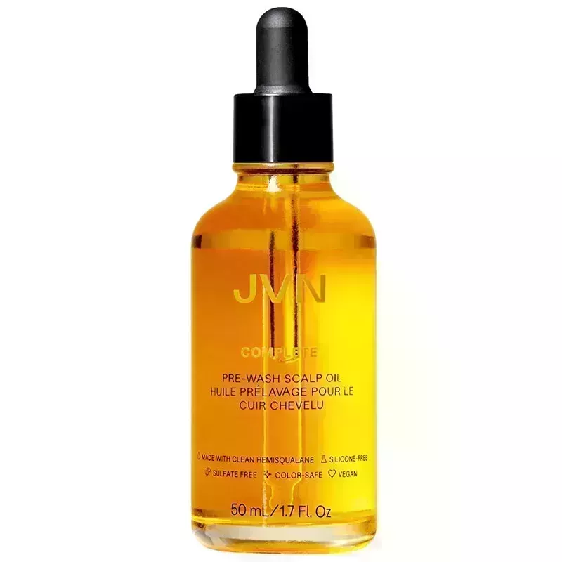 A vial of the JVN Complete Pre-Wash Scalp & Hair Treatment Oil on a white background