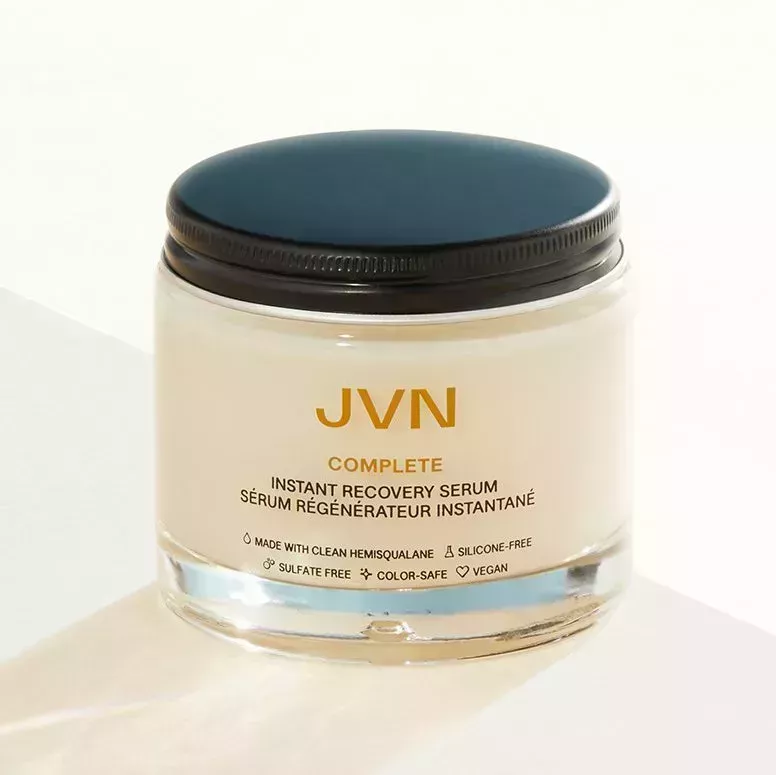 jar of JVN Complete Instant recovery serum on a white background