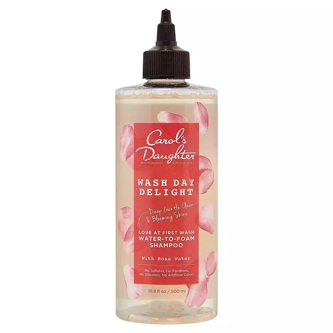 bottle of carols daughter wash day delight water to foam shampoo with rose water on a white background