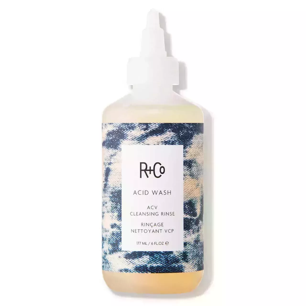 Bottle of R+Co Acid Wash ACV Rinse