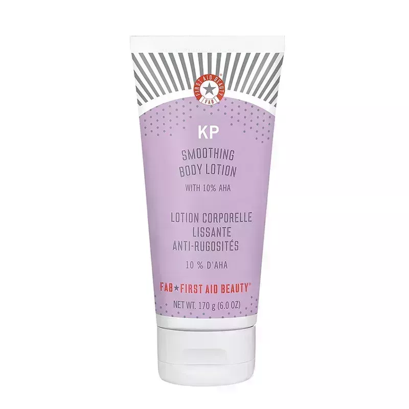 A photo of the First Aid Beauty KP Smoothing Body Lotion on a white background