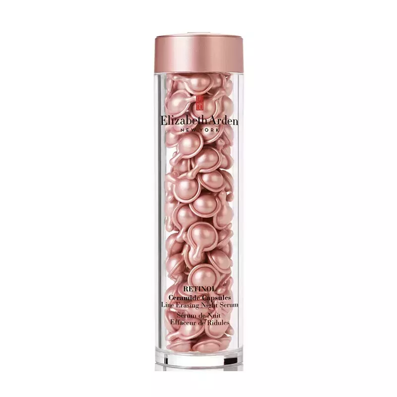 A tube filled with the Elizabeth Arden Retinol Ceramide Capsules Line Erasing Night Serum on a white background
