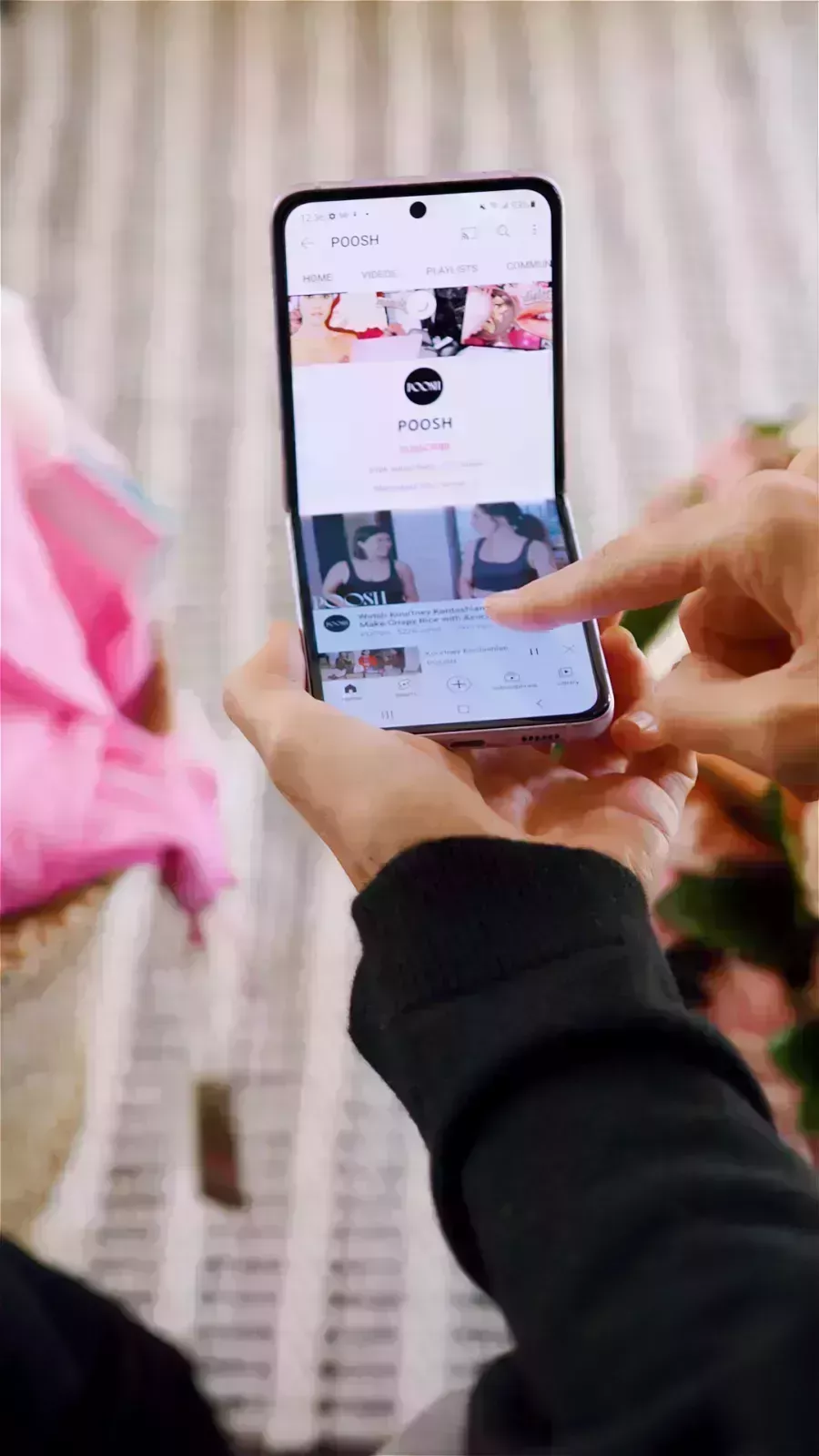 poosh home page on samsung phone screen