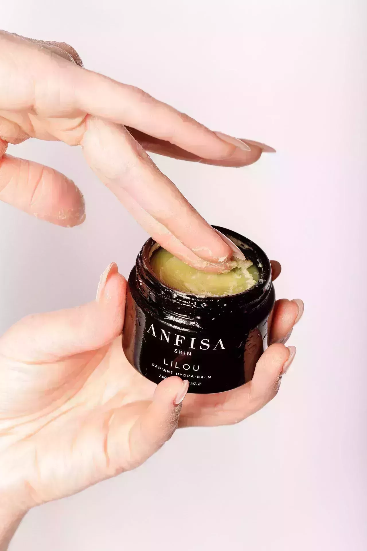 Image may contain: Human, Person, Finger, and Bottle