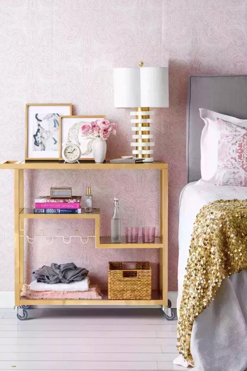 pink and gray bedroom, gold bar cart with pink wallpaper