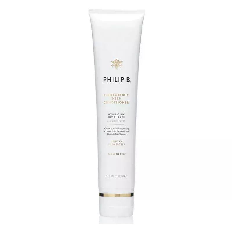 A white tube of the Philip B Lightweight Deep Conditioner on a white background