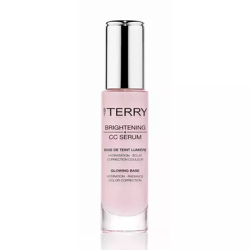 A pink glass bottle of the By Terry Rose Elixir Cellularose Brightening CC Serum on a white background