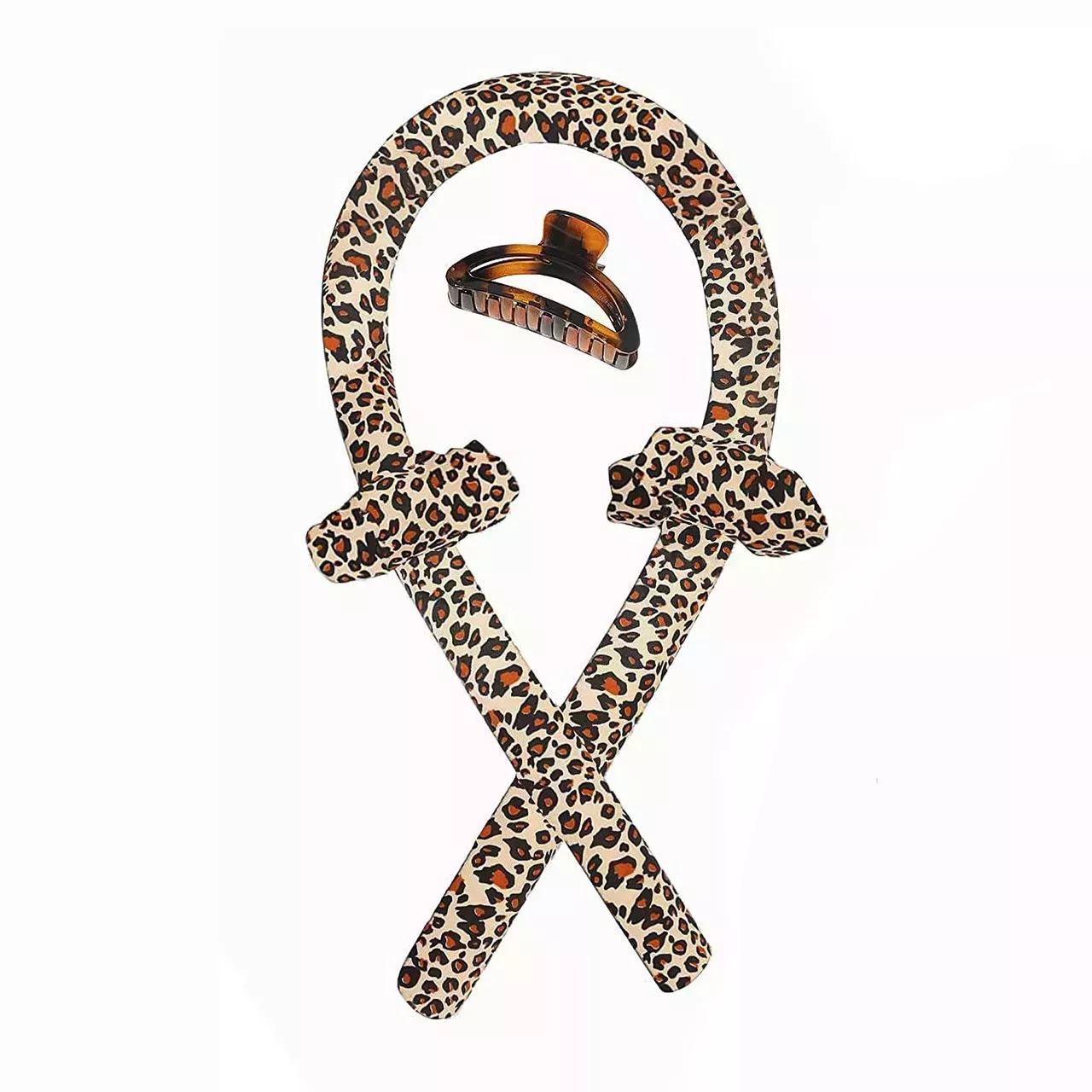 leopard print silk curler, scrunchies, and jaw clip on a white background
