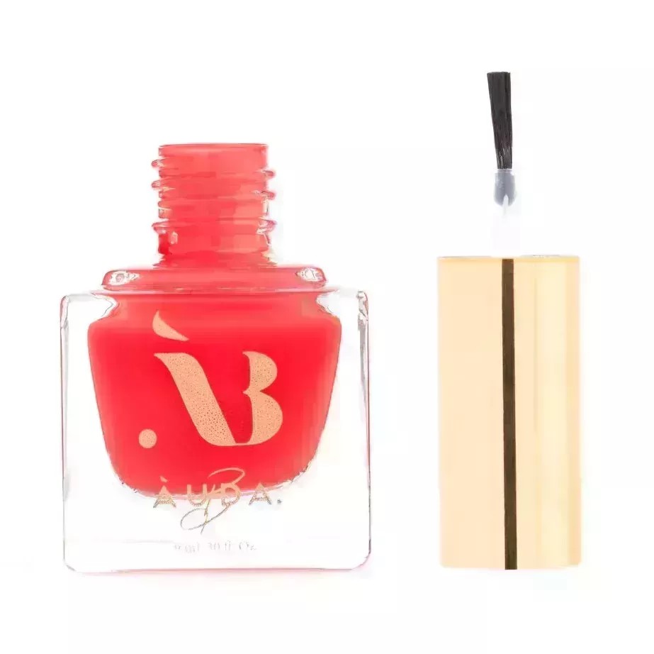 Open bottle of Àuda.B Nail Polish in Coral Sand