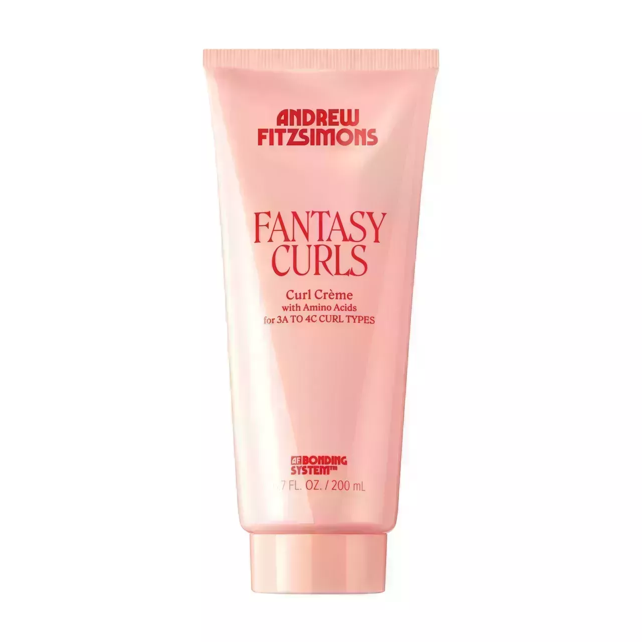 pink squeeze bottle of Andrew Fitzsimons Fantasy Curls Curl Creme on a white background