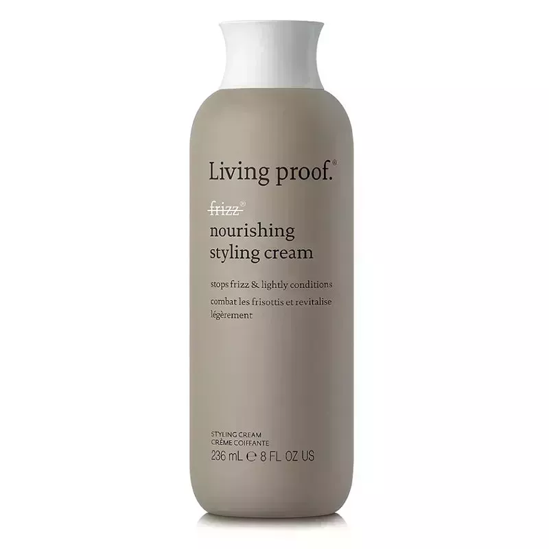 A gray bottle of the Living Proof No Frizz Nourishing Styling Cream on a white background