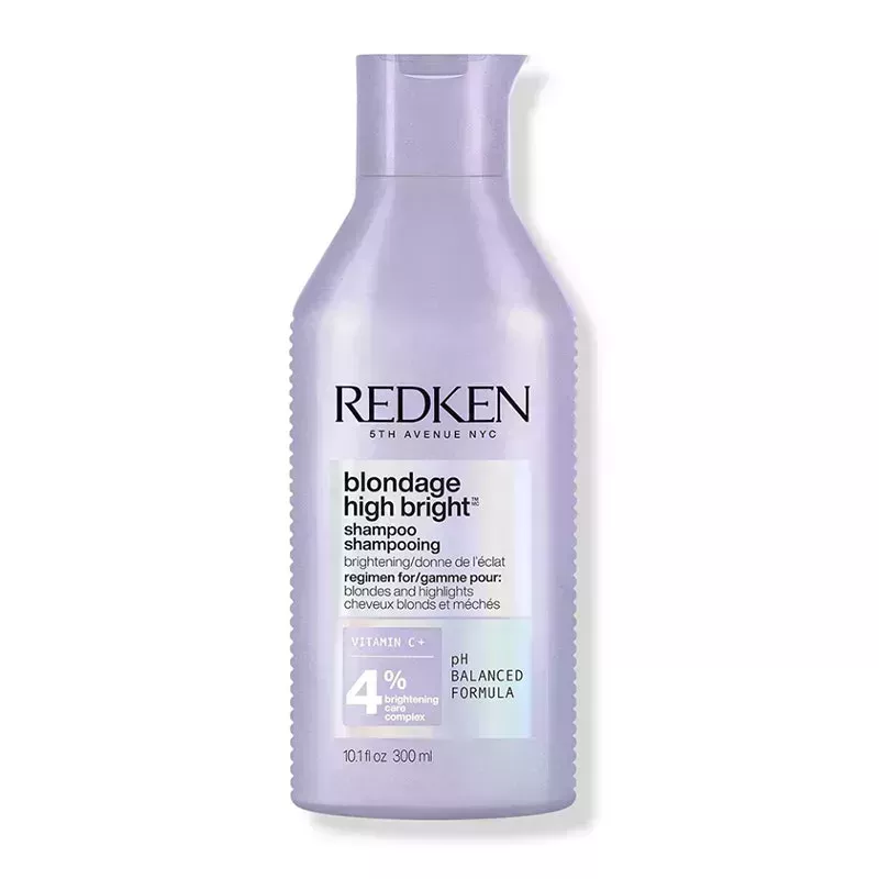A lavender bottle of the Redken Blondage High Bright Shampoo on a white background