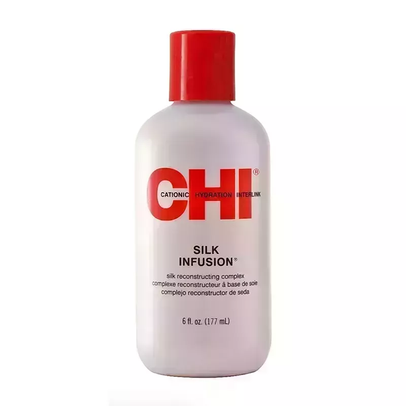 A white and red bottle of the Chi Silk Infusion Silk Reconstructing Complex on a white background