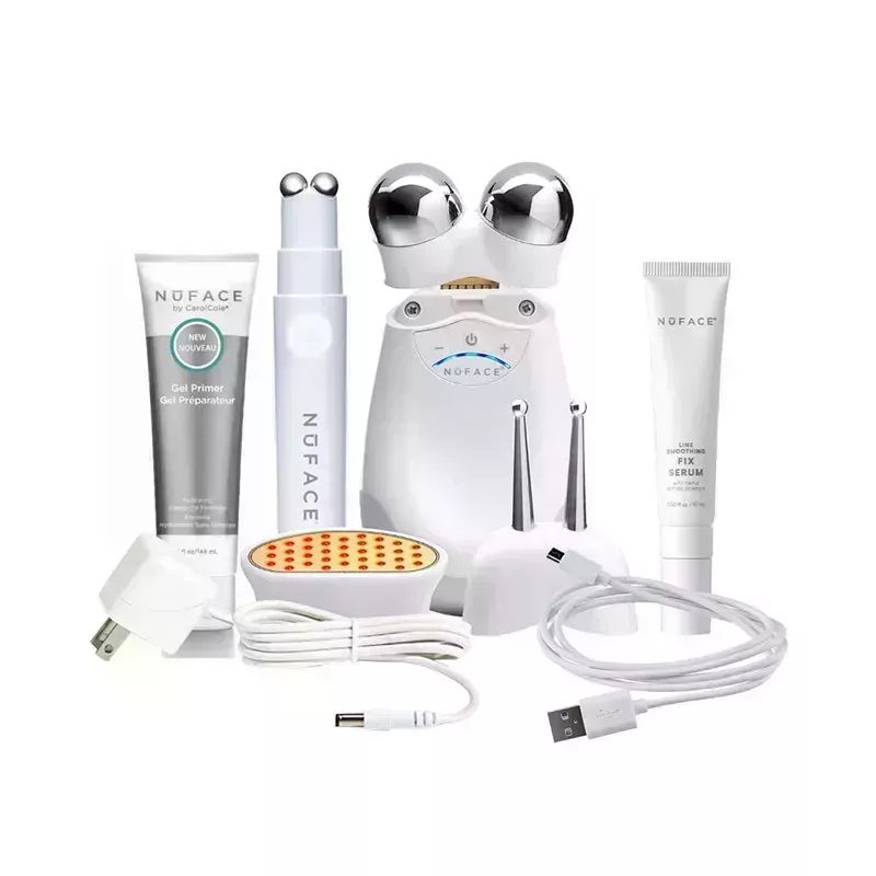 the NuFace Ultimate All-In-One Gift Set, including the NuFace Gel Primer, Fix device, Trinity device with three attachment heads, and Fix Serum on a white background