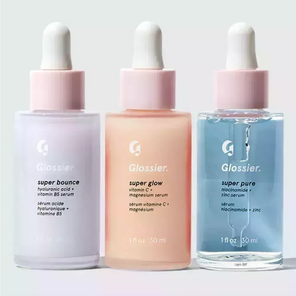 Glossier The Super Pack on gray background