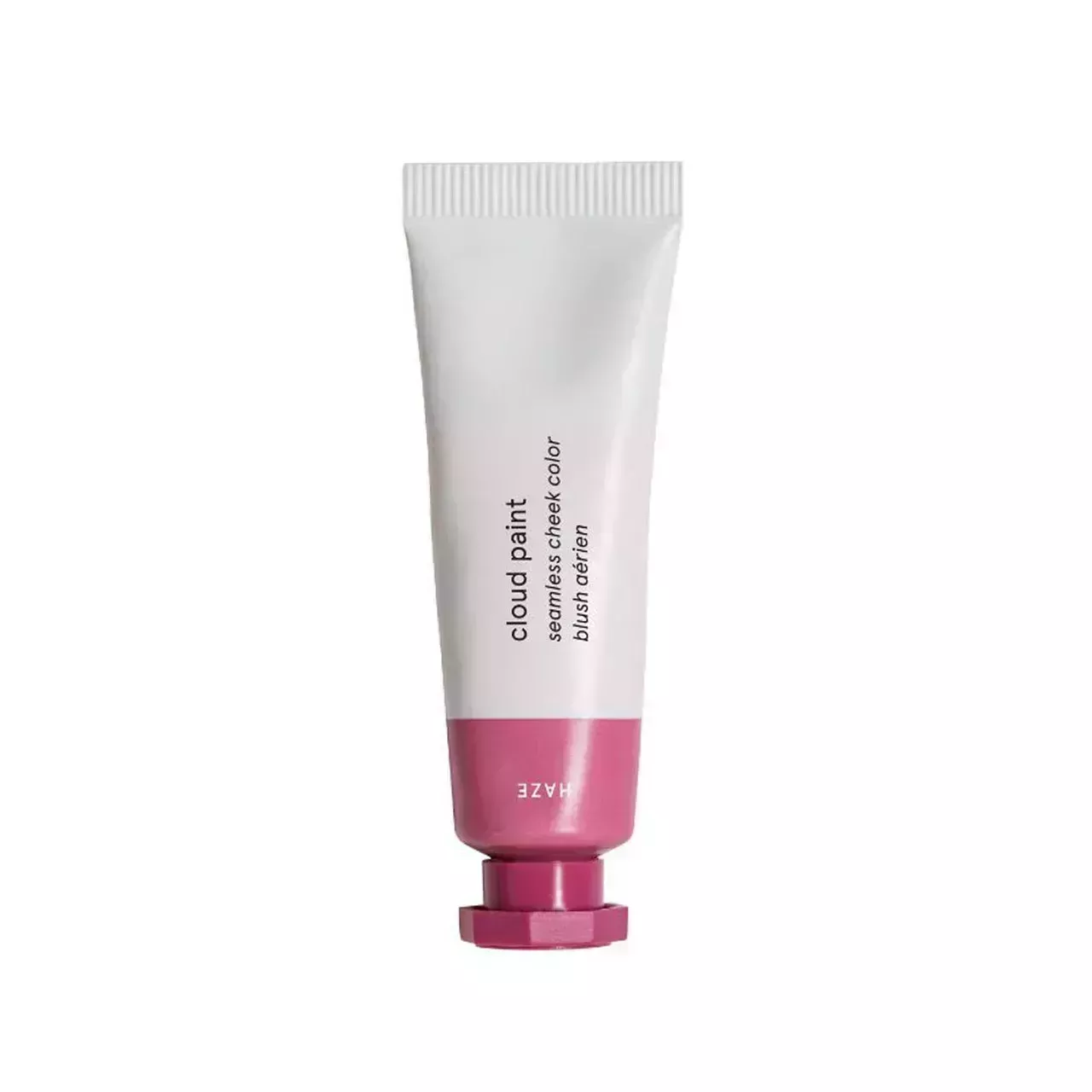 Glossier Cloud Paint white tube with pink stripe and cap on white background