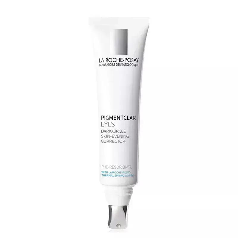 A white tube with silver undereye applicator tip of the La Roche-Posay Pigmentclar Eye Cream on a blank background