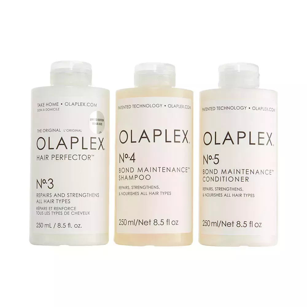 A trio of Olaplex No. 3, No. 4, and No. 5: Olaplex Bond Maintenance Set on white background