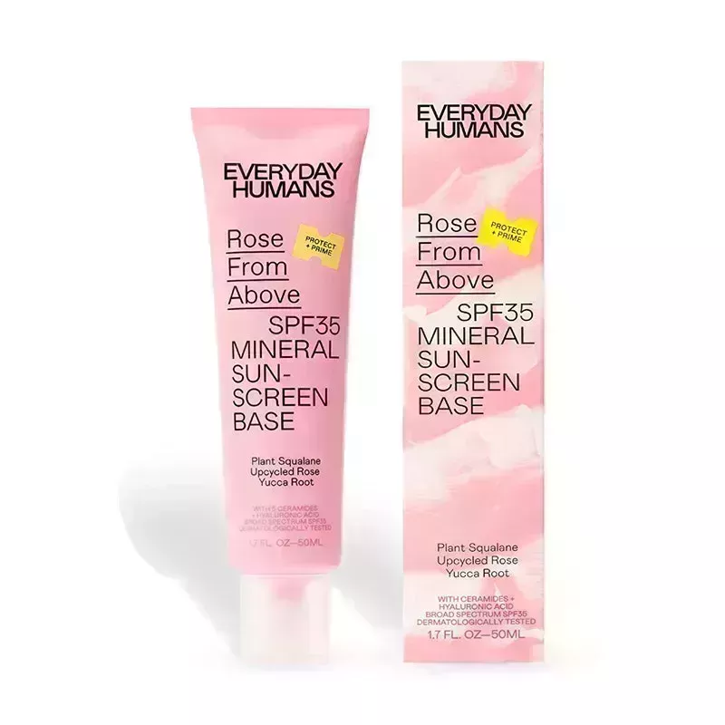 A pink tube of the Everyday Humans Rose From Above SPF 35 Tinted Moisturizer on a white background