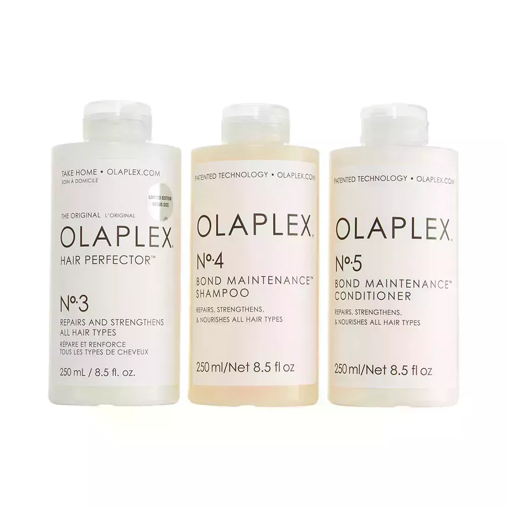 A trio of Olaplex No. 3, No. 4, and No. 5: Olaplex Bond Maintenance Set on white background