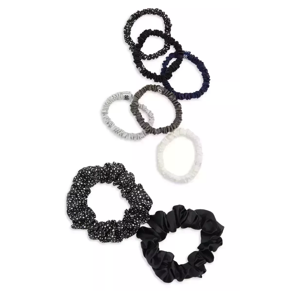 Image may contain: Cushion, Pillow, Jewelry, Accessories, Earring, and Accessory