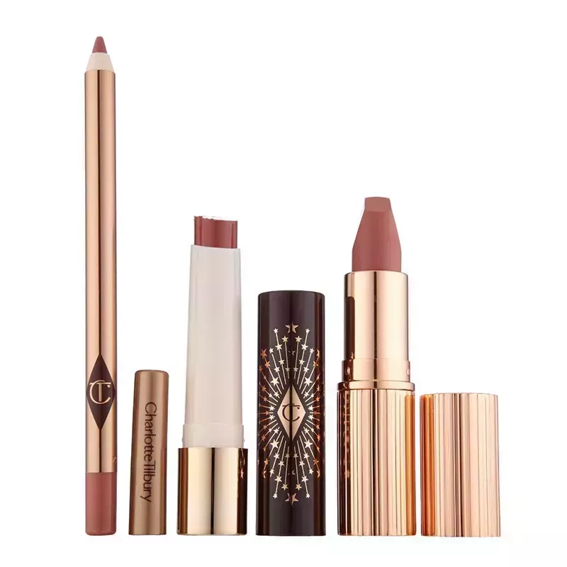 Charlotte Tilbury Pillow Talk Lip Kit lip liner, lip balm, and gold tube of lipstick on white background