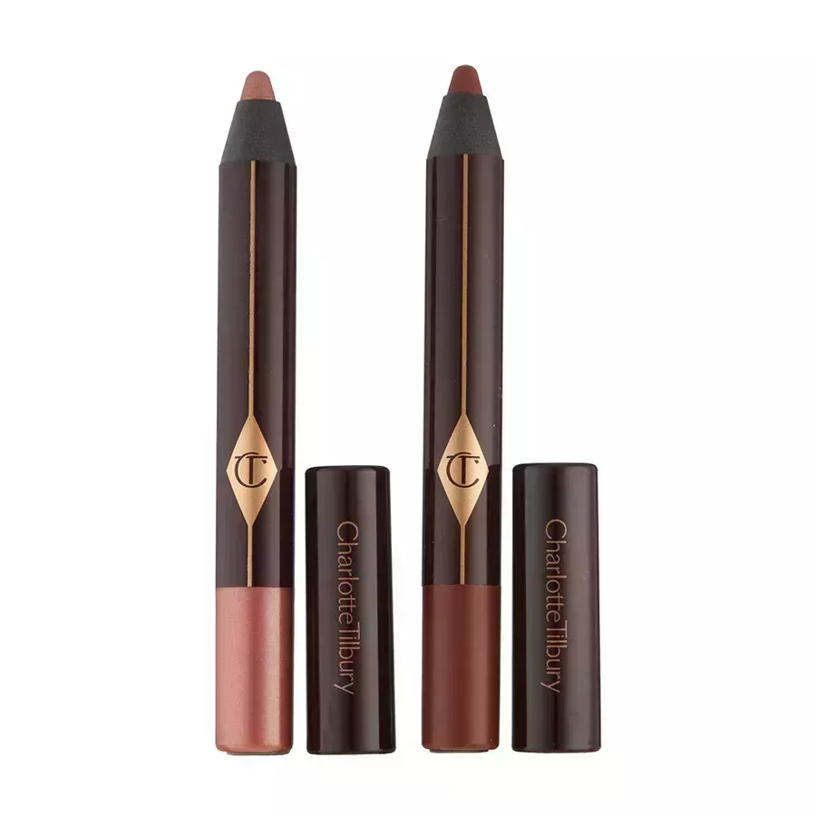 Charlotte Tilbury Eye Enhancing Beauty Secrets Eyeshadow Pencil Set two brown eyeshadow pencils on white background