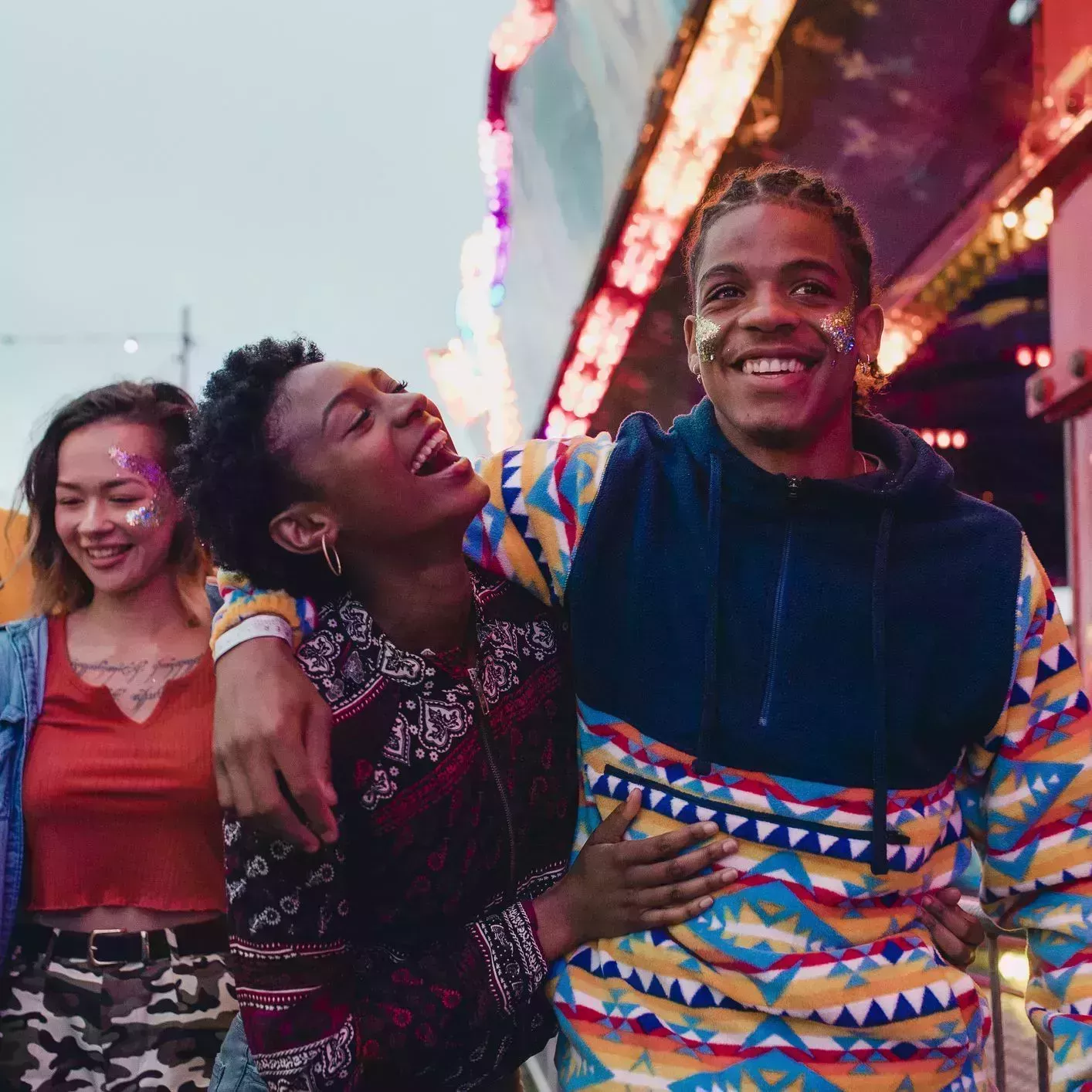 young couple having fun at the fair